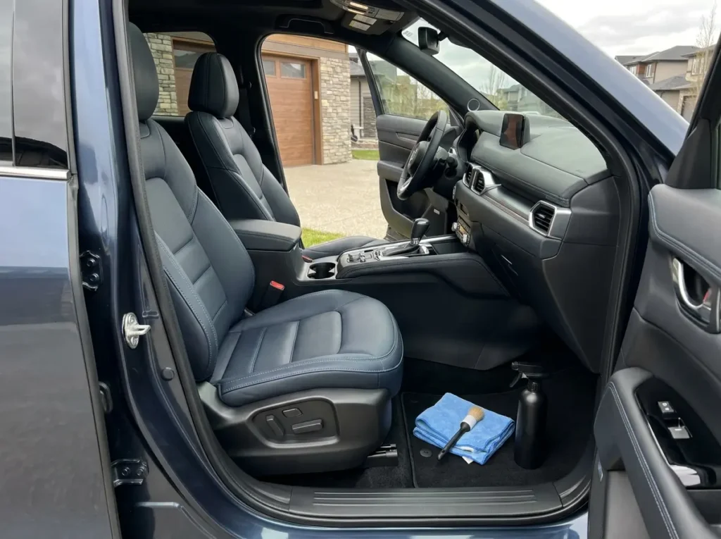 Clean vehicle interior with detailed seats, dashboard, centre console and floor surfaces